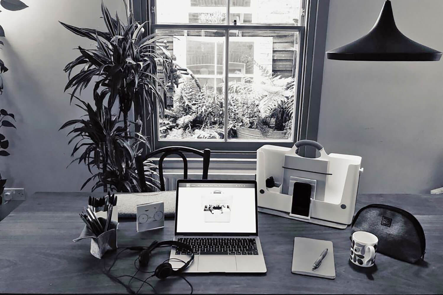 A workspace set up on a dining room table